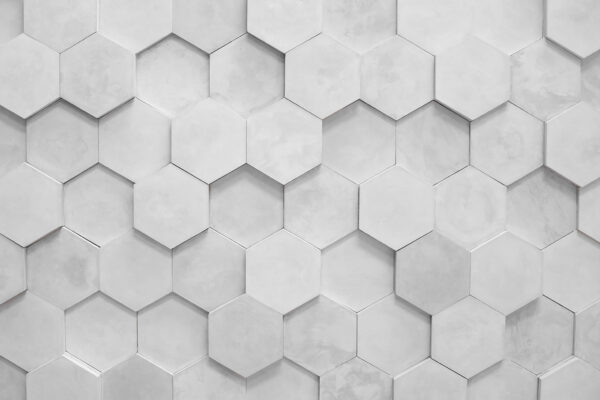 Witte zeshoeken op een muur Witte zeshoeken op een muur