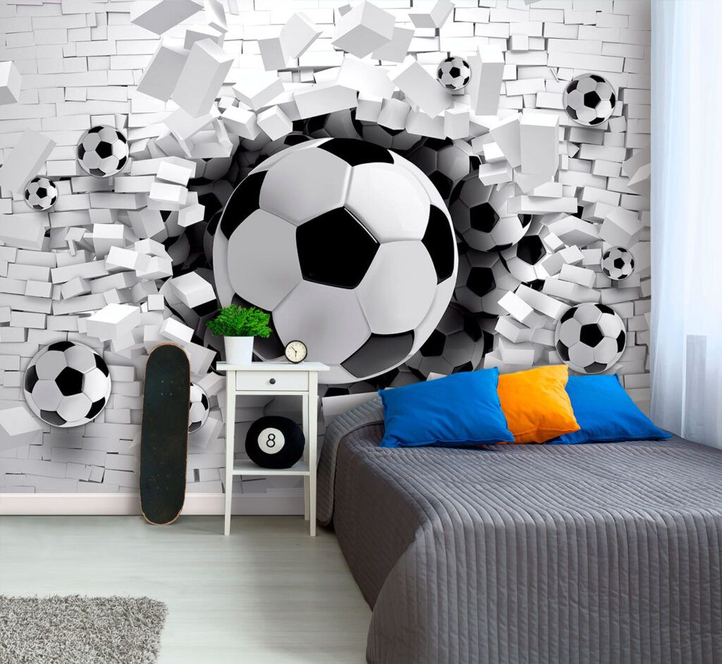 Football ball breaking through a brick wall Football ball breaking through a brick wall