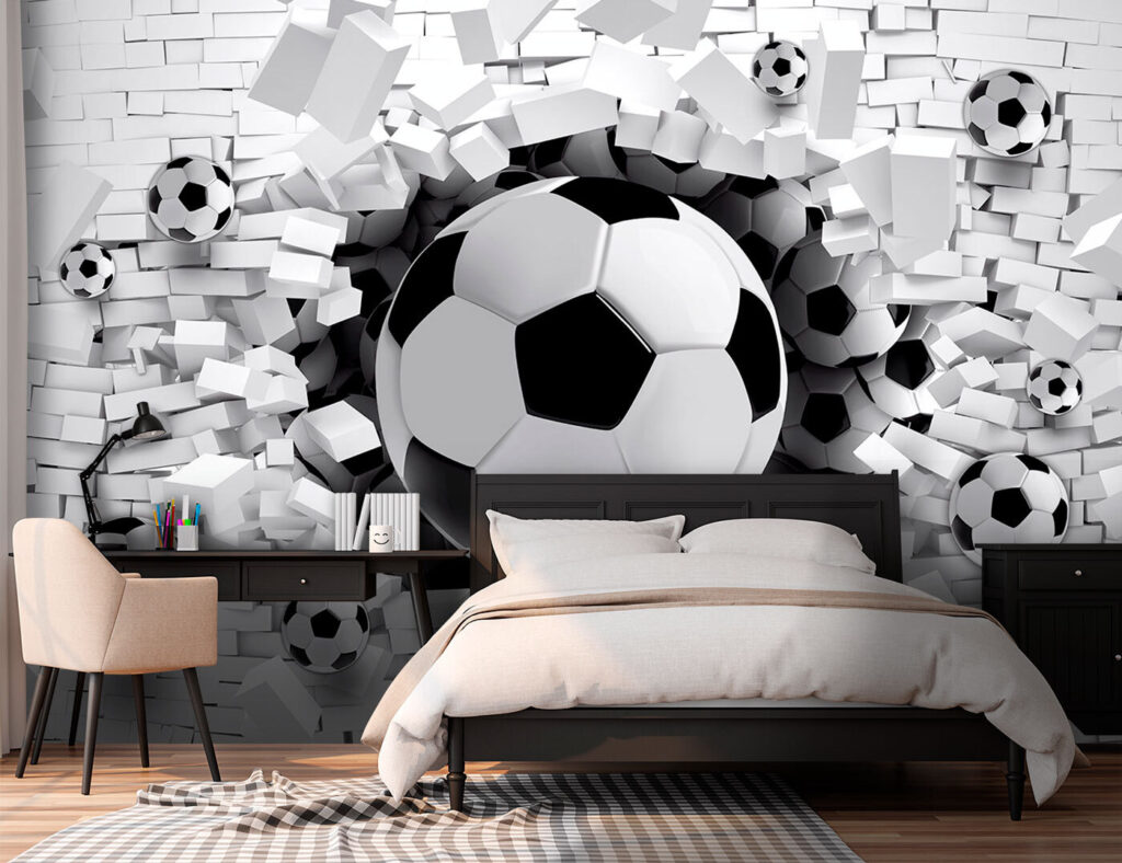 Football ball breaking through a brick wall Football ball breaking through a brick wall