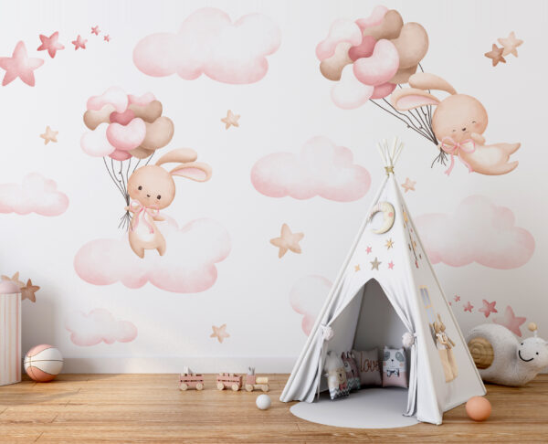 Groep roze wolken en een konijn met ballonnen Groep roze wolken en een konijn met ballonnen