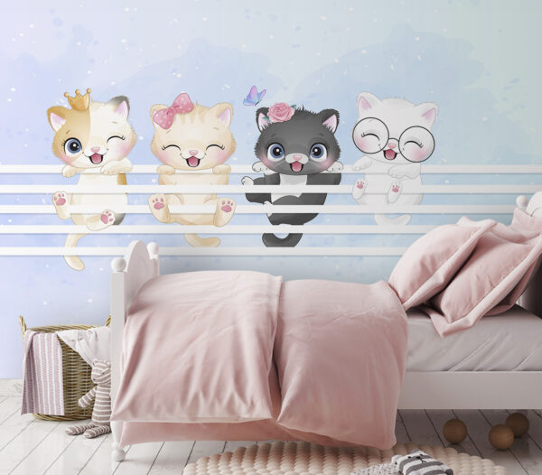 Groep kittens op een wit hek Groep kittens op een wit hek