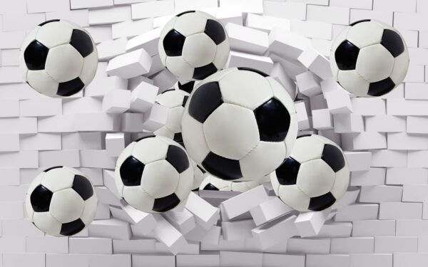 Groep voetballen vliegt over een muur Groep voetballen vliegt over een muur