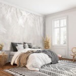 Fotobehang Witte bladeren op een grijs oppervlak