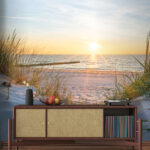 Fotobehang Strand met gras en water