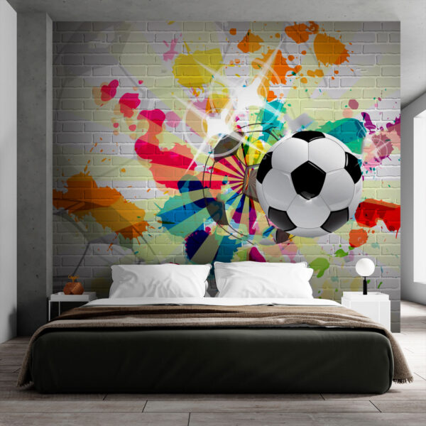Voetbal op een bakstenen muur Voetbal op een bakstenen muur