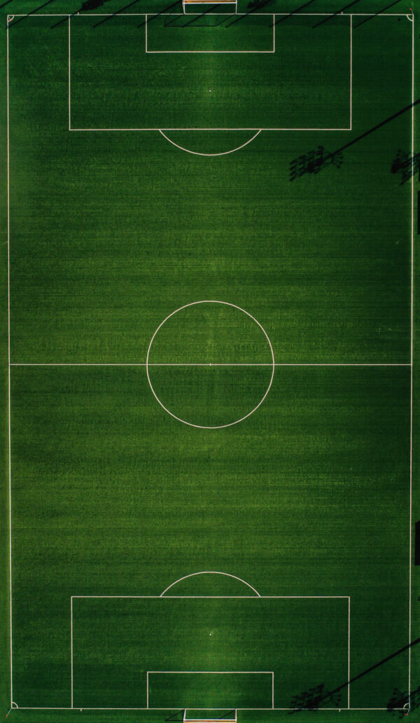 Voetbalveld met een witte cirkel Voetbalveld met een witte cirkel
