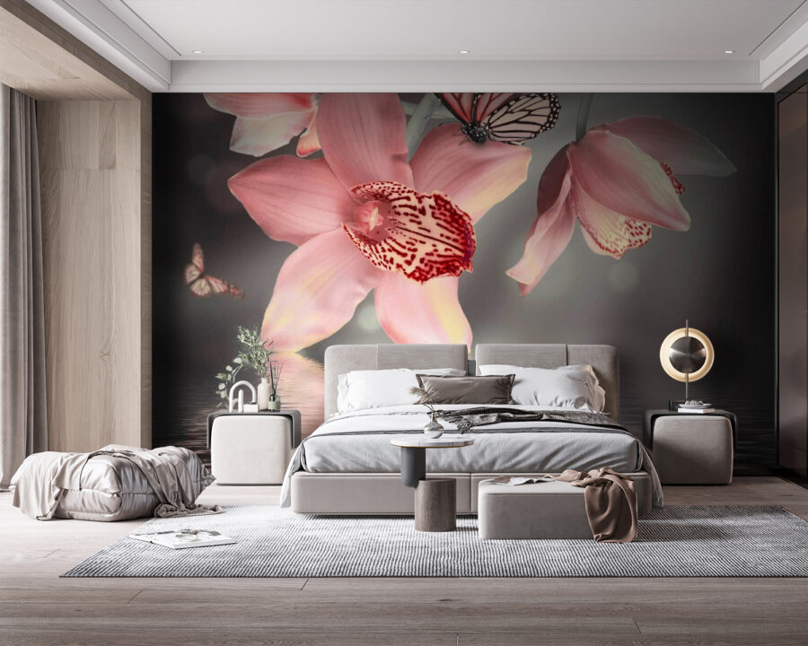Roze orchideeën en vlinders op een tak Roze orchideeën en vlinders op een tak