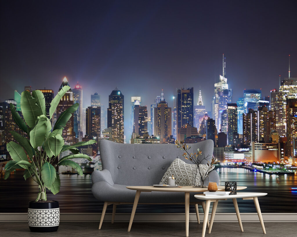 City skyline at night with lights reflecting on water City skyline at night with lights reflecting on water