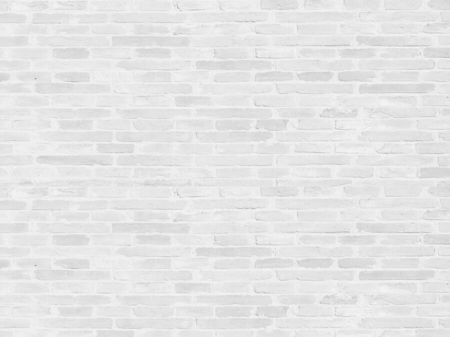Witte bakstenen muur met veel rechthoekige bakstenen