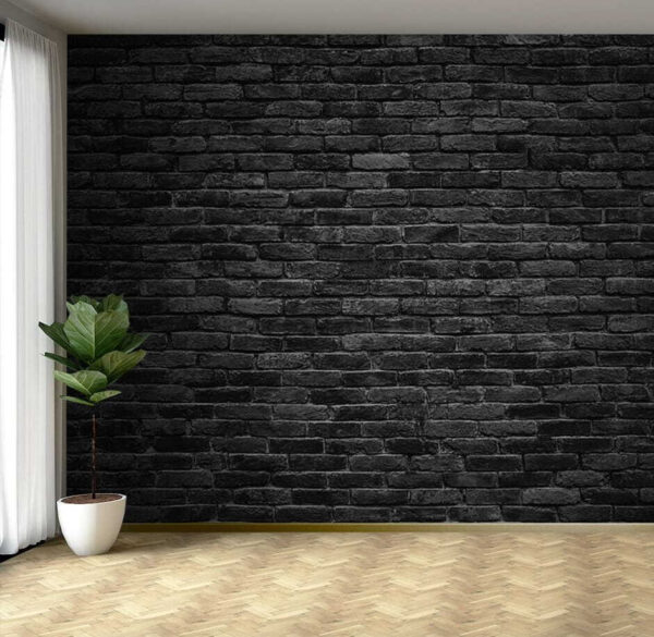 Zwarte bakstenen muur met een witte vlek Zwarte bakstenen muur met een witte vlek