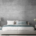 Fotobehang Grijs betonoppervlak met kleine vlekjes