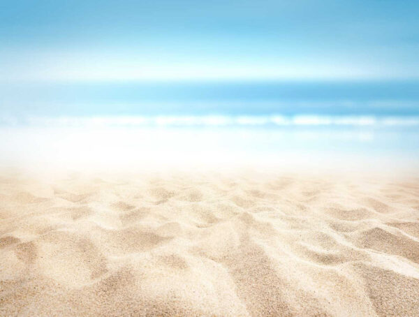 Zandstrand met blauwe lucht Zandstrand met blauwe lucht