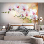 Fotobehang Witte orchideeën op een tak met waterribbels