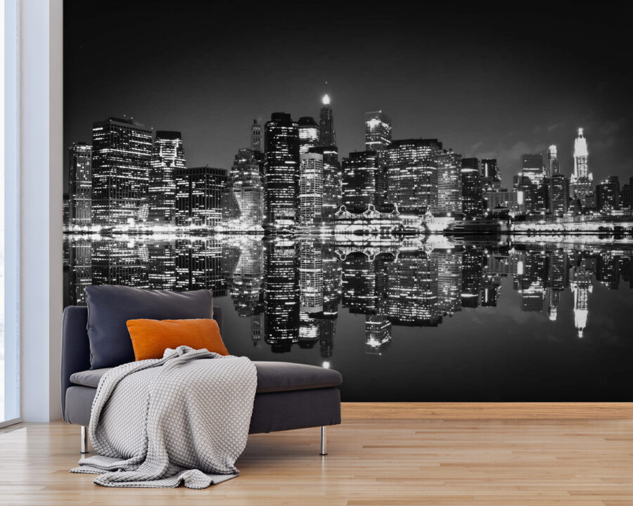 Skyline van de stad bij nacht met lichten die reflecteren op het water