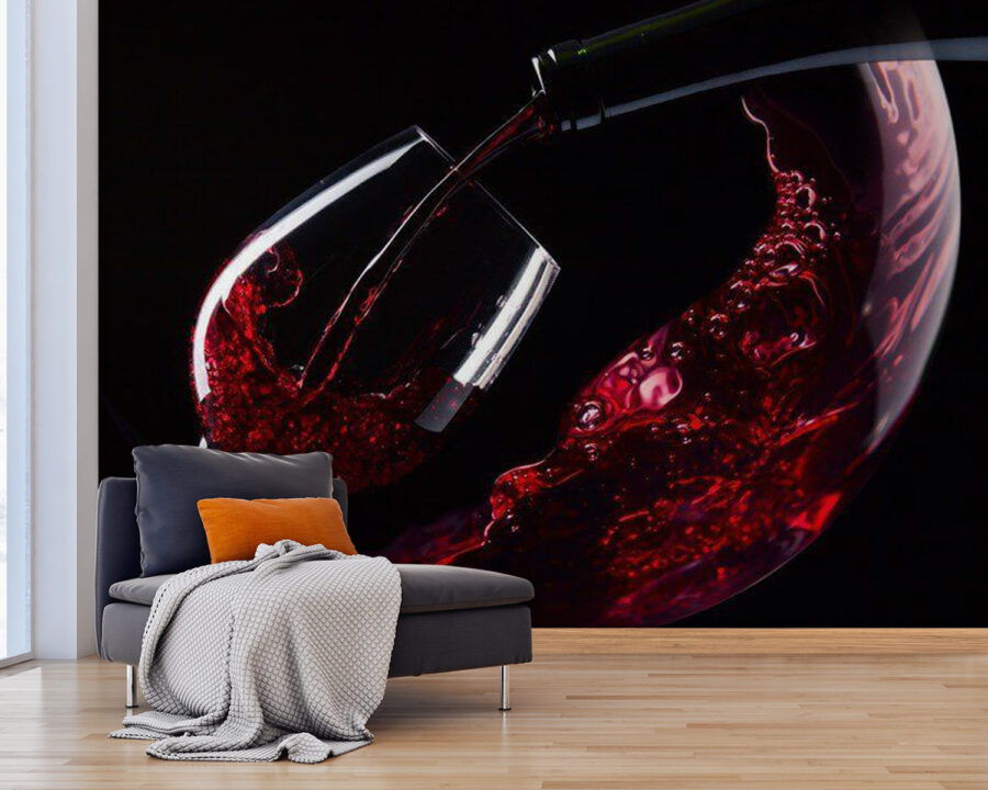 Glas rode wijn wordt ingeschonken Glas rode wijn wordt ingeschonken