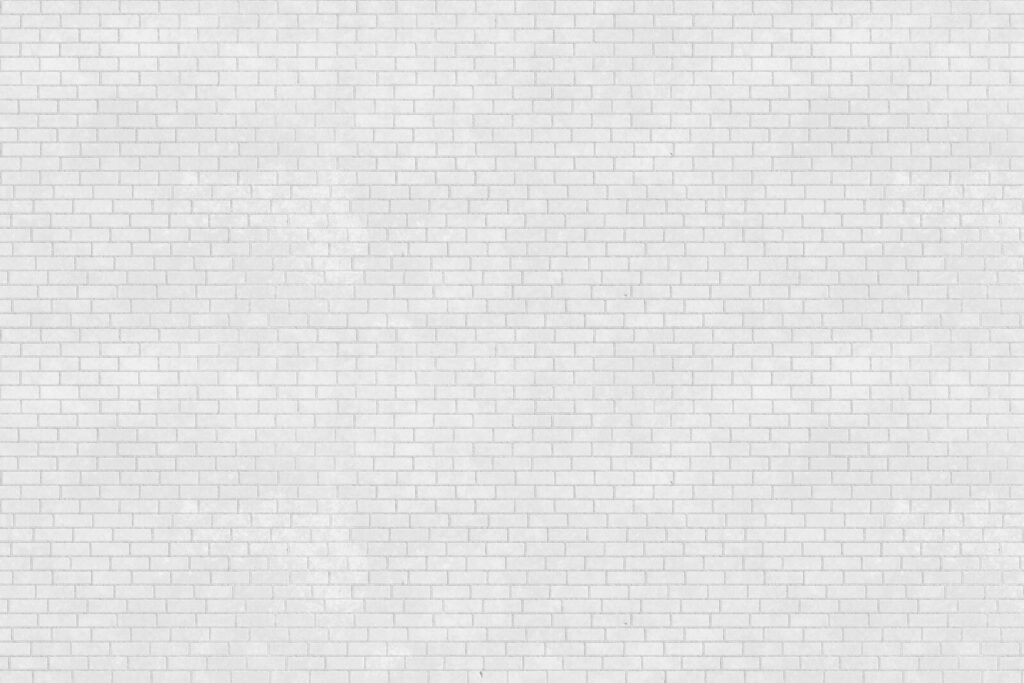 Witte bakstenen muur met veel kleine bakstenen Witte bakstenen muur met veel kleine bakstenen