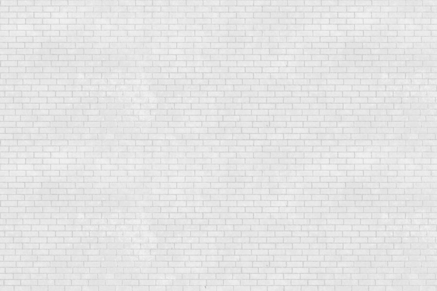 Witte bakstenen muur met veel kleine bakstenen Witte bakstenen muur met veel kleine bakstenen