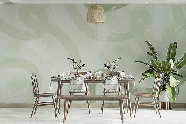 A white surface with green paint strokes