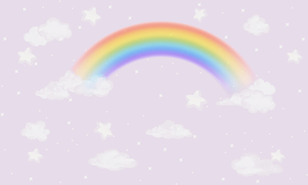 A rainbow and clouds in the sky