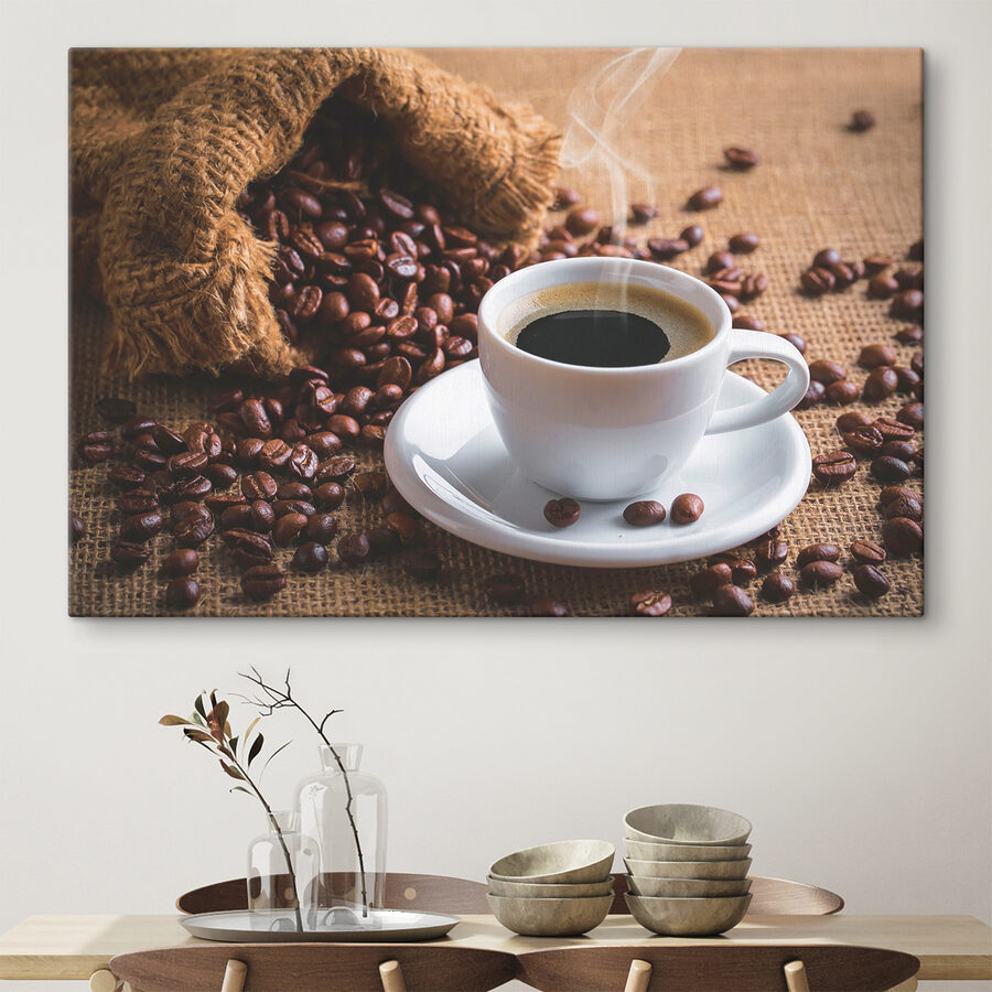 Een kop koffie en een zak koffiebonen Een kop koffie en een zak koffiebonen