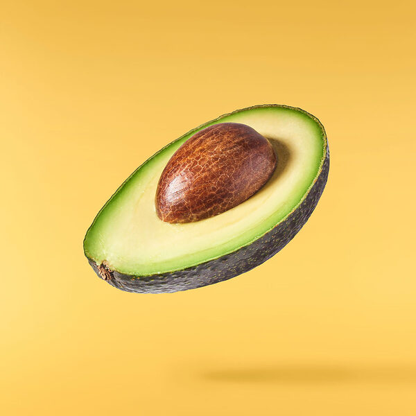 Een avocado doormidden gesneden Een avocado doormidden gesneden
