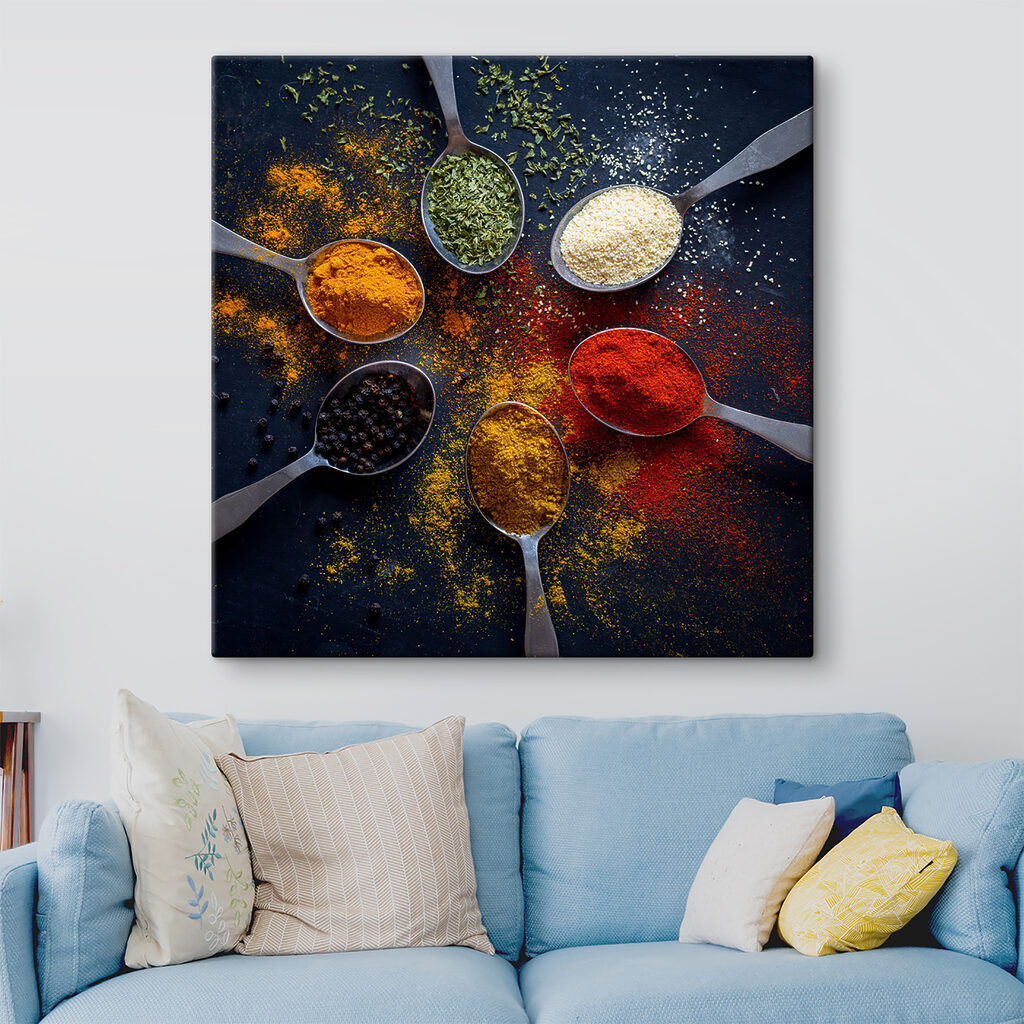 A group of spoons with different spices