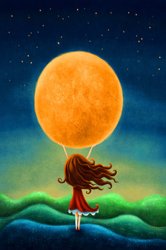 A girl holding a large yellow moon A girl holding a large yellow moon