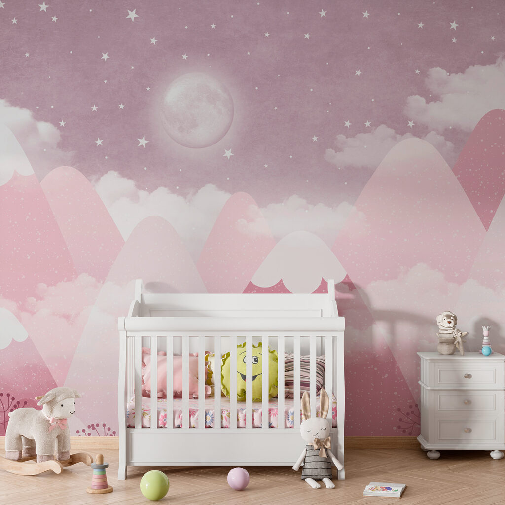 A moon and clouds over mountains