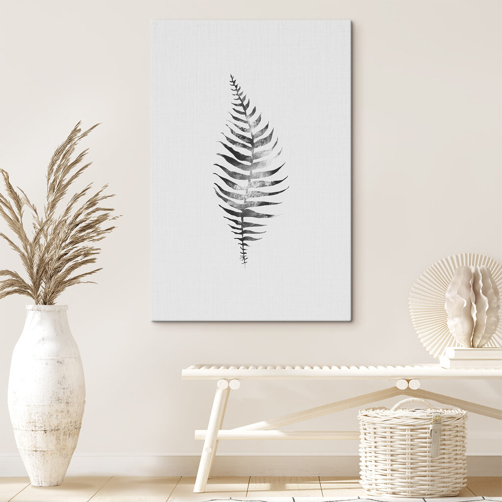 A black and white image of a fern leaf