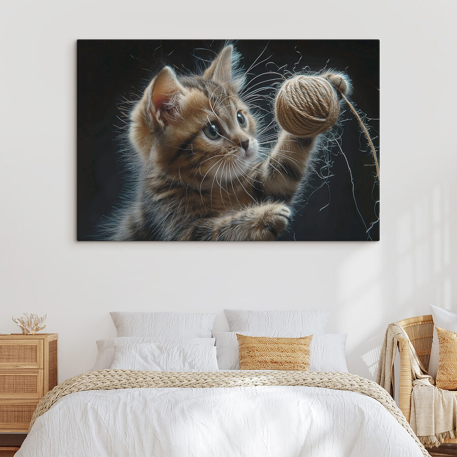 Een kat speelt met een bal garen Een kat speelt met een bal garen