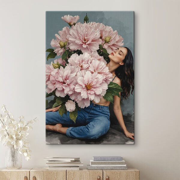 Een vrouw zittend op een vloer met een groot boeket bloemen Een vrouw zittend op een vloer met een groot boeket bloemen