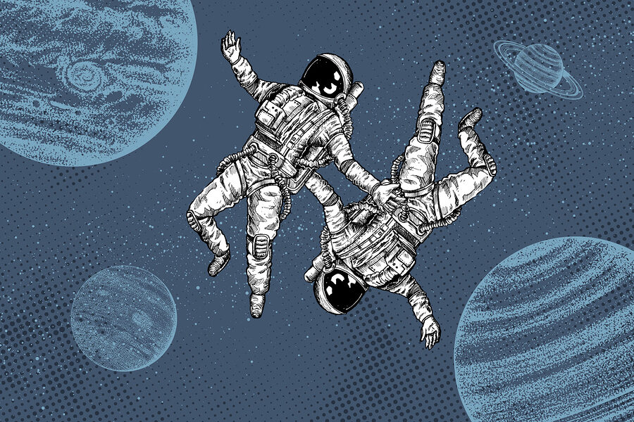 Twee astronauten zweven in de ruimte