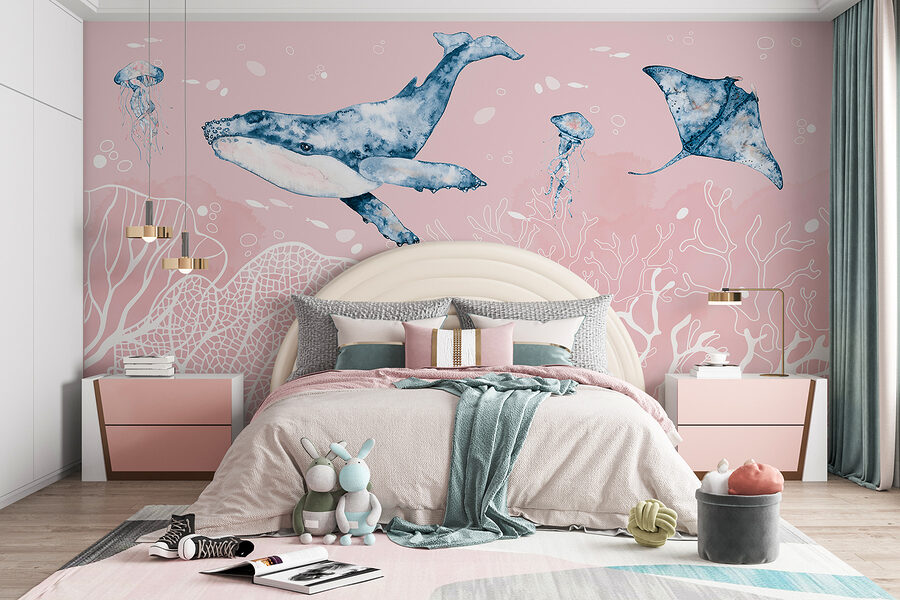 Een walvis en pijlstaartroggen zwemmend in de oceaan