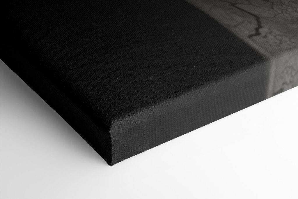 A statue of a woman with a cracked face and snakes around her face