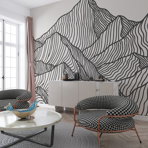 A black and white drawing of a mountain range