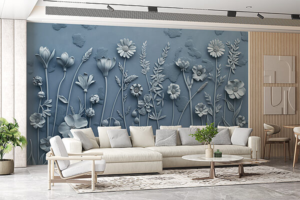 Een grijze muur met bloemen en bladeren Een grijze muur met bloemen en bladeren