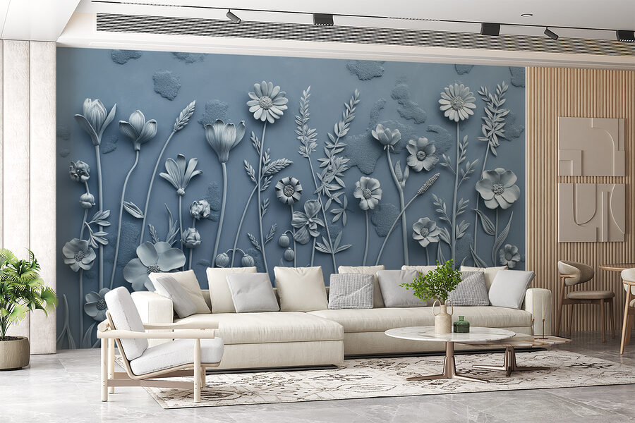 Een grijze muur met bloemen en bladeren Een grijze muur met bloemen en bladeren