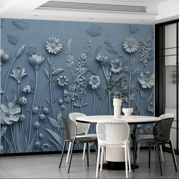 Een grijze muur met bloemen en bladeren Een grijze muur met bloemen en bladeren