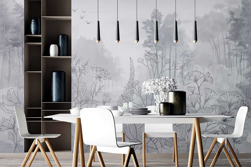 Greyscale image of a forest with birds flying