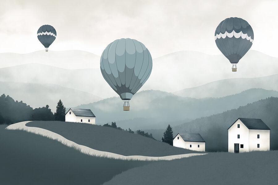 Groep heteluchtballonnen vliegend over een dorp