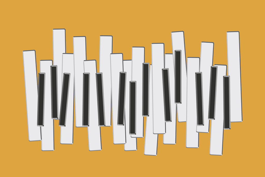 Pianotoetsen op gele achtergrond Pianotoetsen op gele achtergrond