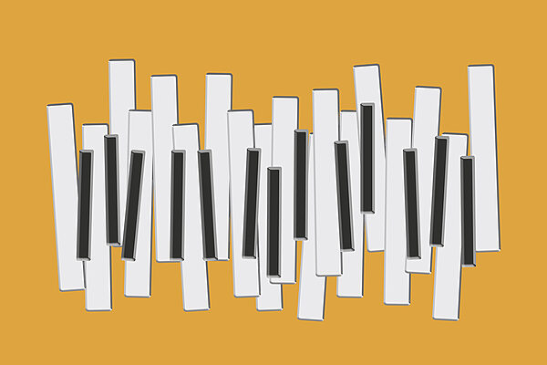 Pianotoetsen op gele achtergrond Pianotoetsen op gele achtergrond