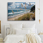Canvas Schilderijen Strand met hoog gras en water