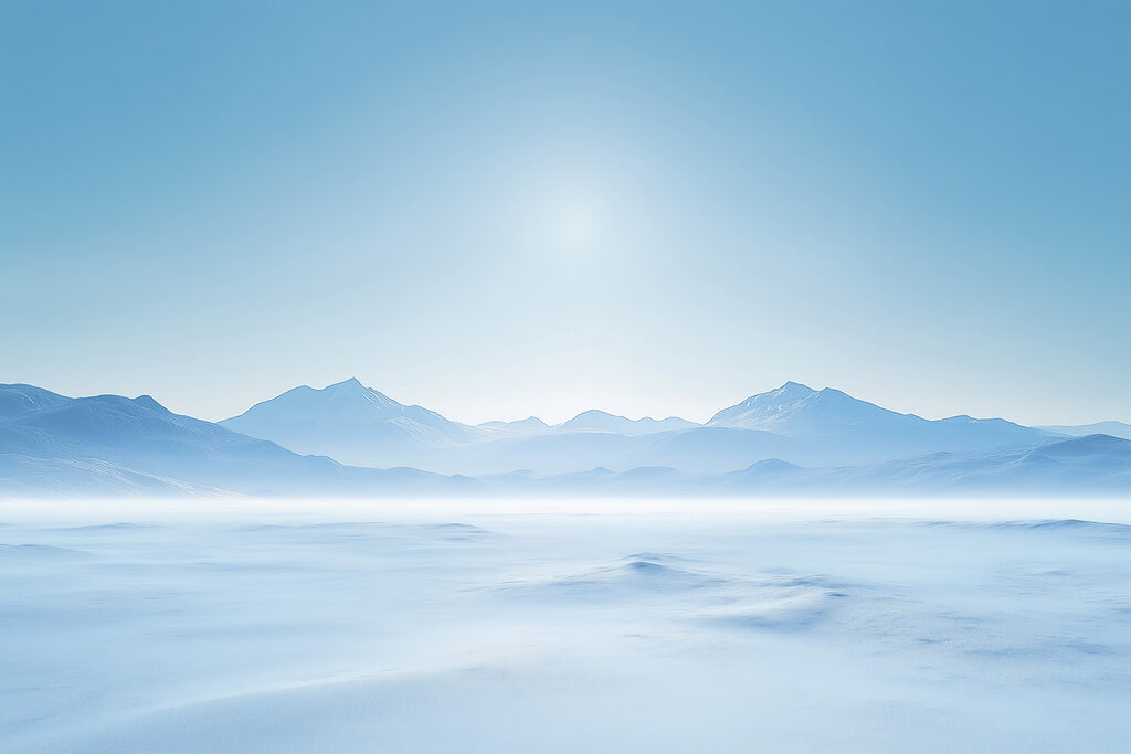 Besneeuwd landschap met bergen in de verte Besneeuwd landschap met bergen in de verte