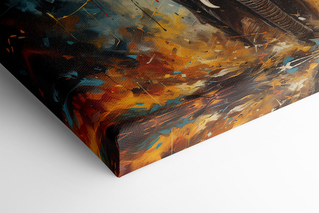 An elephant with tusks and dirt