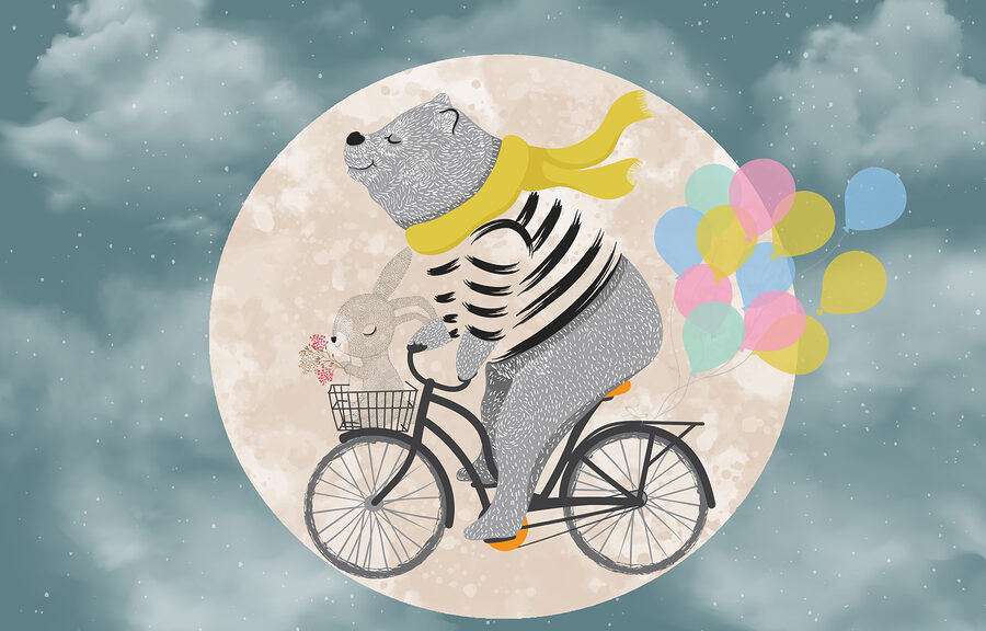 Beer op een fiets met ballonnen
