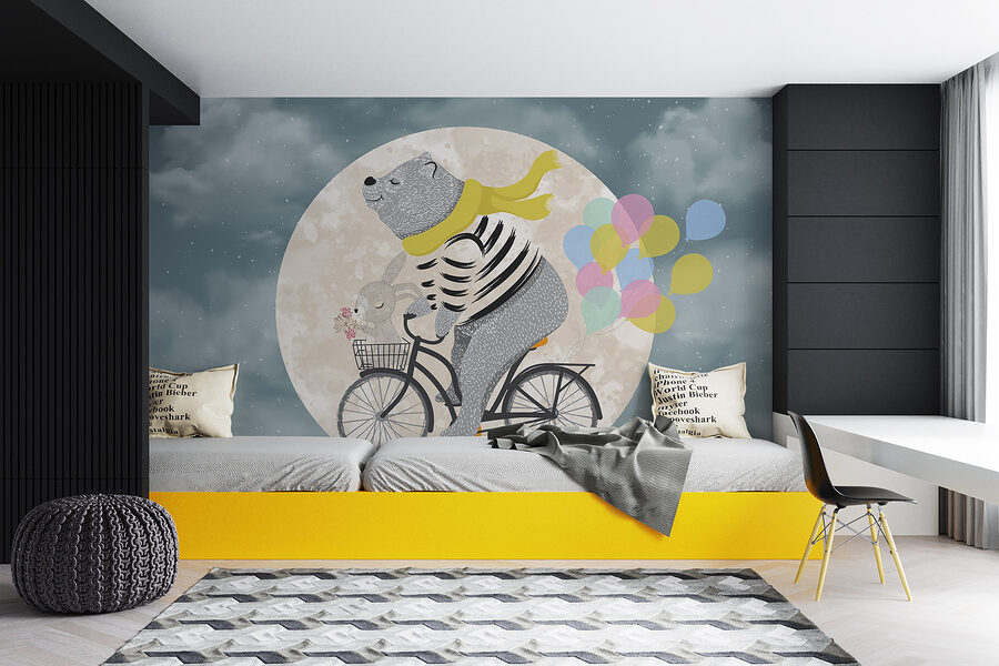 Beer op een fiets met ballonnen