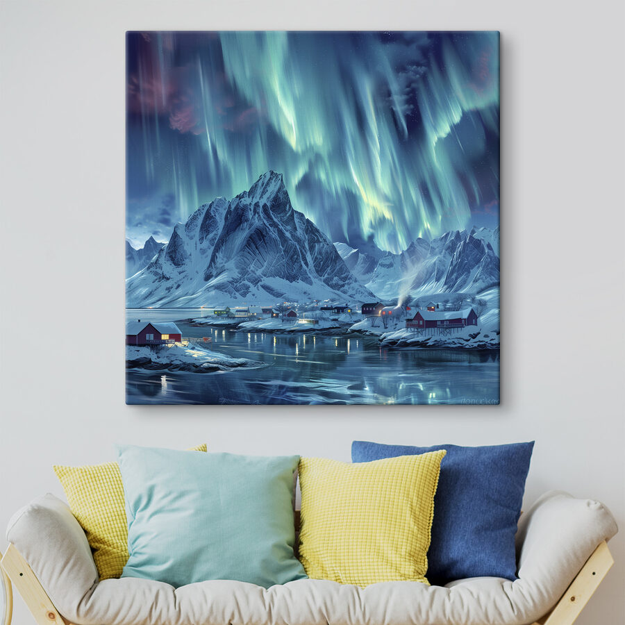 Besneeuwde bergketen met een dorp in de verte