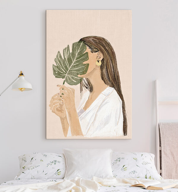Vrouw die een blad vasthoudt Vrouw die een blad vasthoudt
