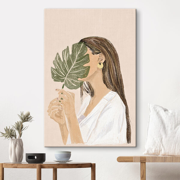 Vrouw die een blad vasthoudt Vrouw die een blad vasthoudt